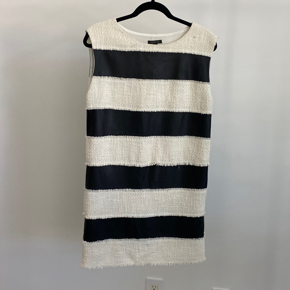 black stripes are leather looking~ maybe faux? No fabric/washing tags sewn in